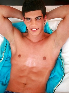 Brunette twink shows his long cock