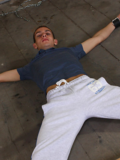 Tied down and restrained in almost every way for cute boy