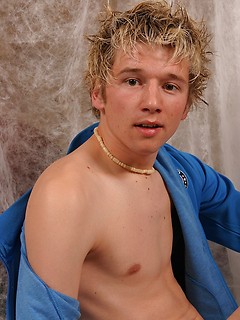 Blonde twink getting naked and showing uncut dick